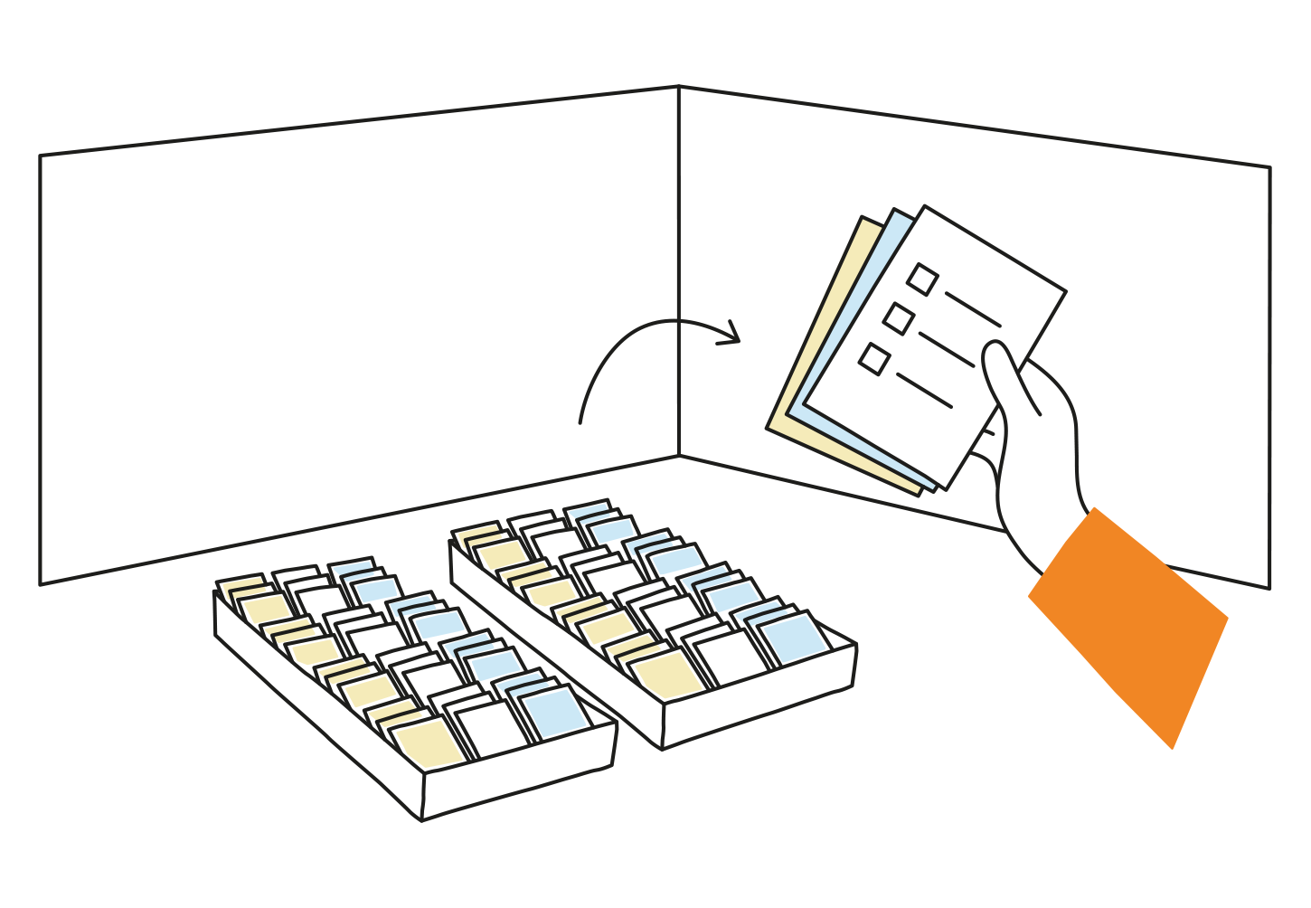 Ballot paper rack containing yellow, blue and white ballot papers. A hand is selecting one ballot paper of each colour.